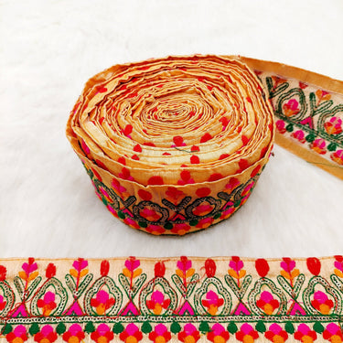 Peach Fabric Trim With Green, Fuchsia Pink, Red And Orange Embroidery and Gold Sequins